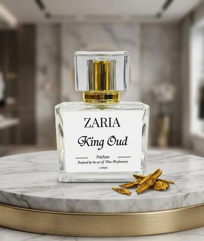 Zaria King Oud perfume bottle on a marble surface with blurred background