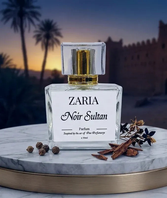 Zaria Noir Sultan perfume bottle on a marble surface with a desert background